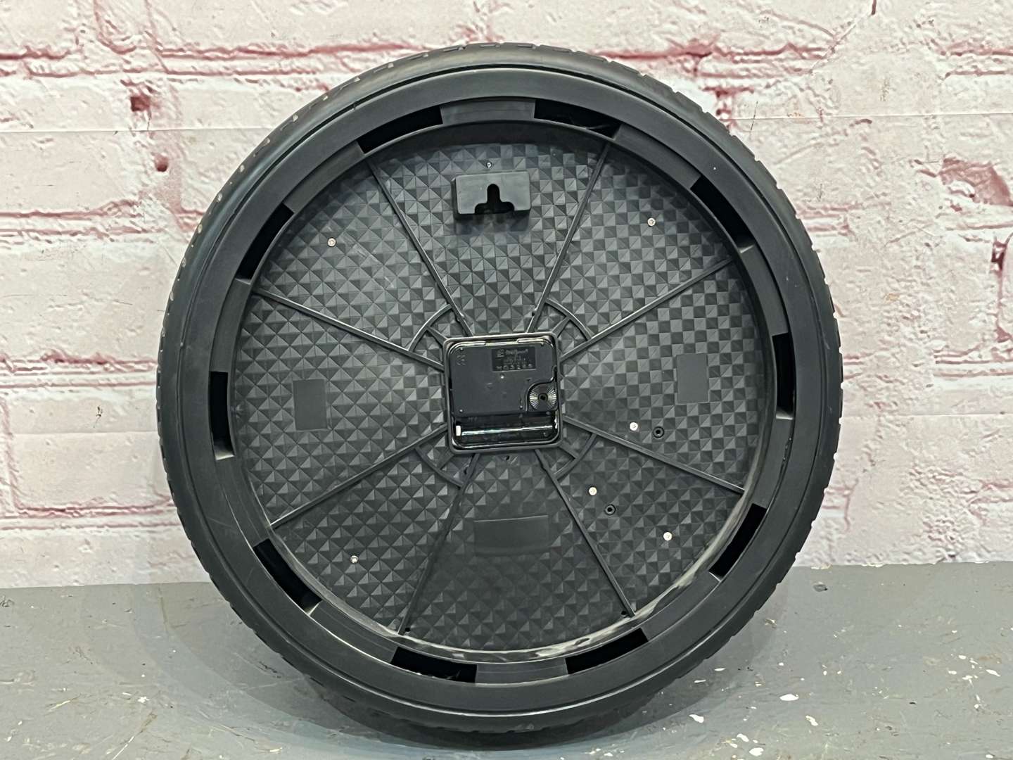 <p>Wall Clock in The Form of a Wheel</p>