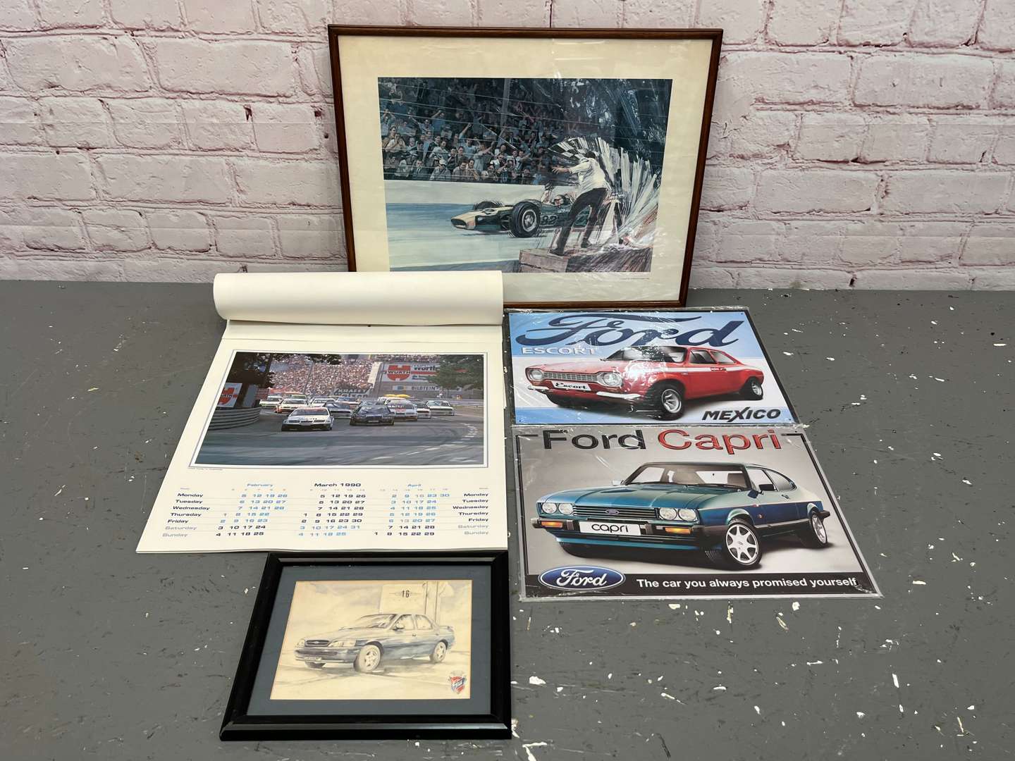 <p>Two Ford Tin Signs, 1990 Ford Calendar Ford Ghia Print & Jim Clark Print (5)</p>