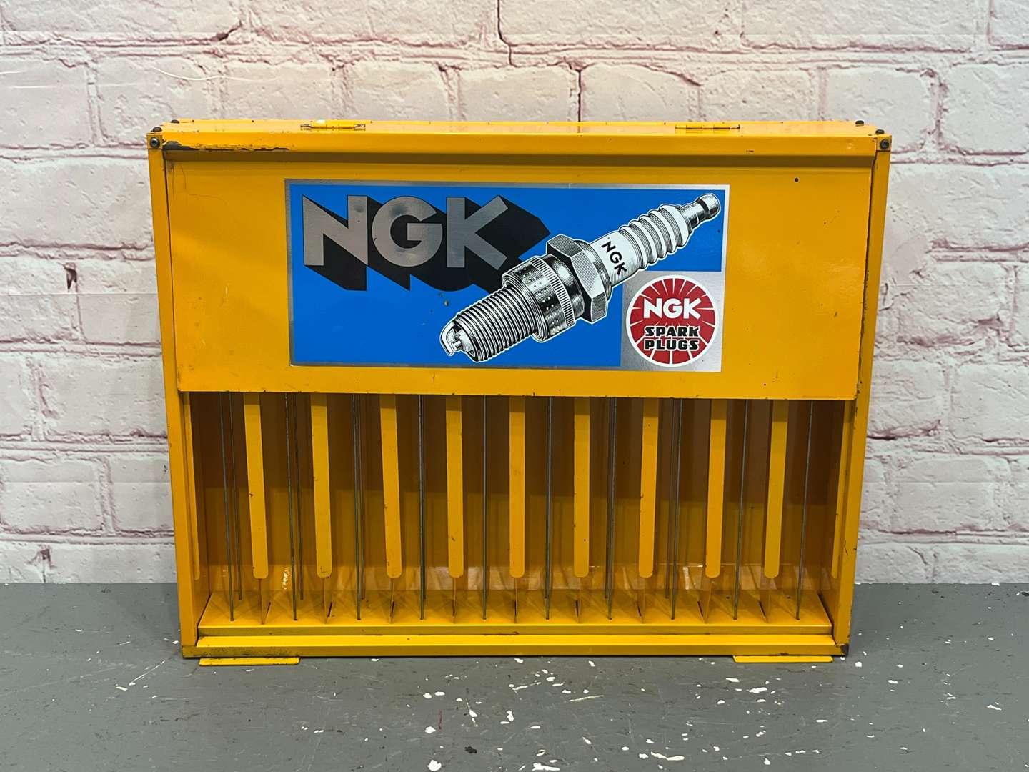<p>NGK Spark Plug Wall Mounted Display Rack</p>