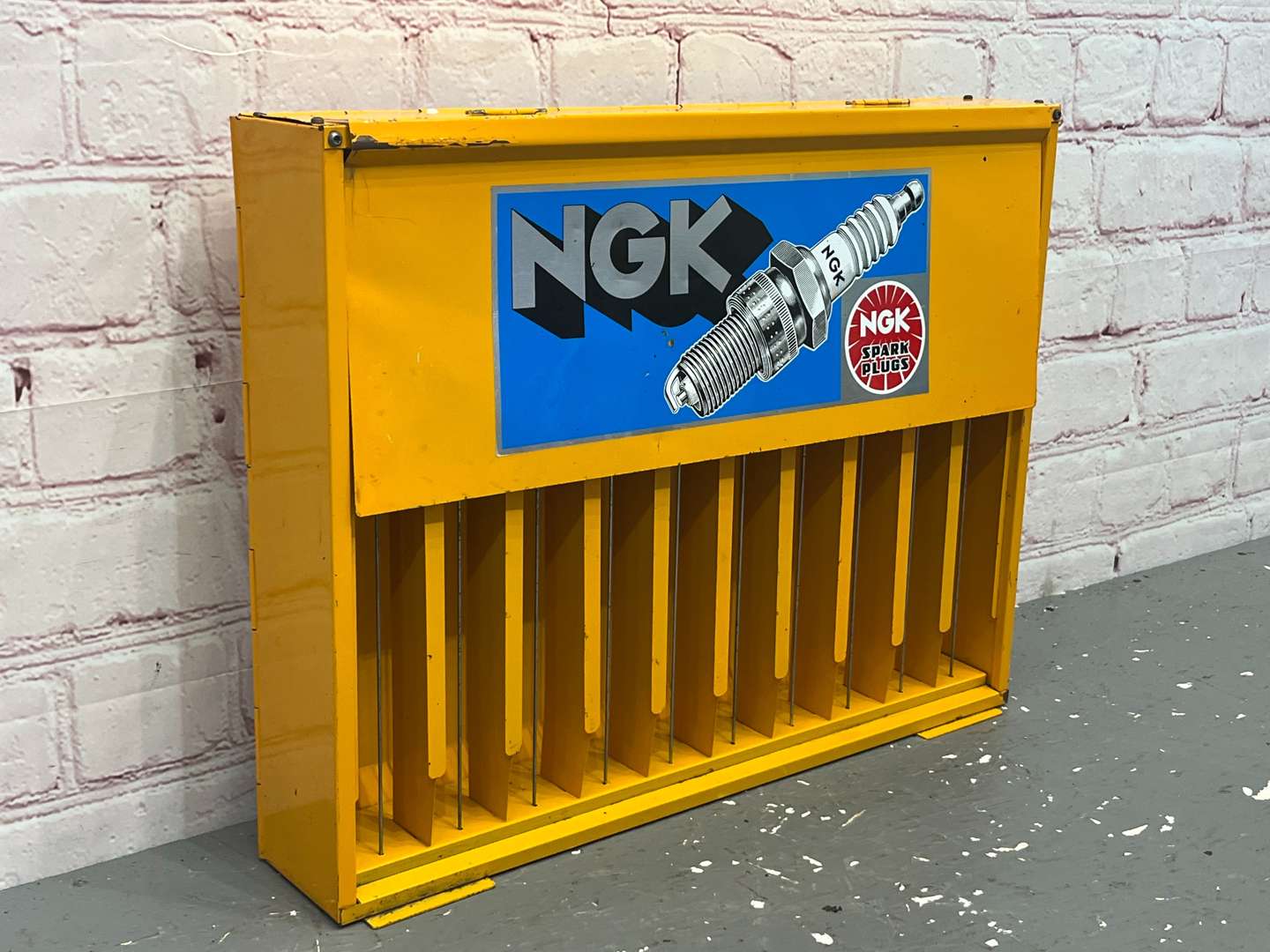 <p>NGK Spark Plug Wall Mounted Display Rack</p>