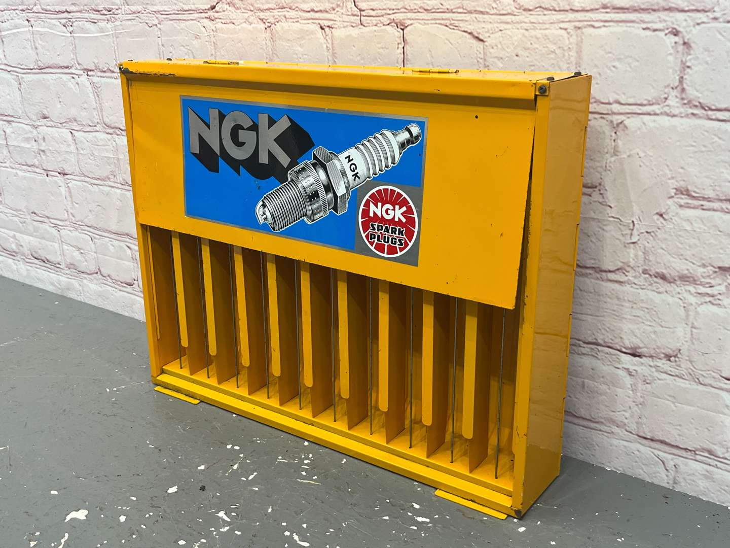 <p>NGK Spark Plug Wall Mounted Display Rack</p>
