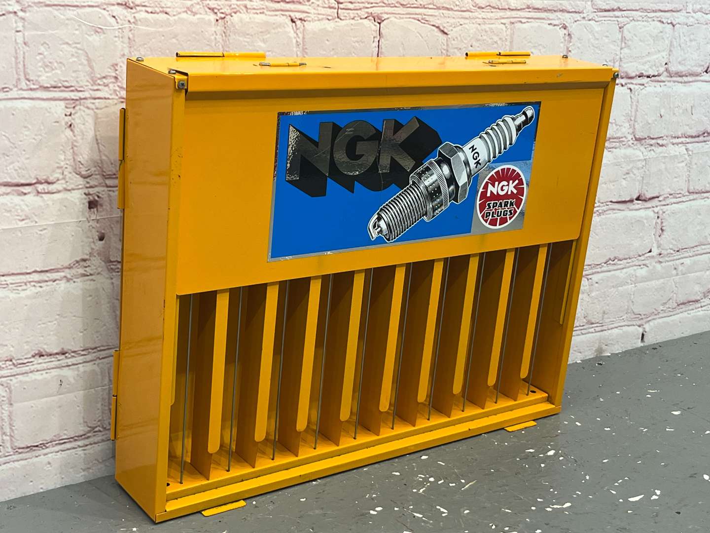 <p>NGK Spark Plug Wall Mounted Display Rack &nbsp;</p>