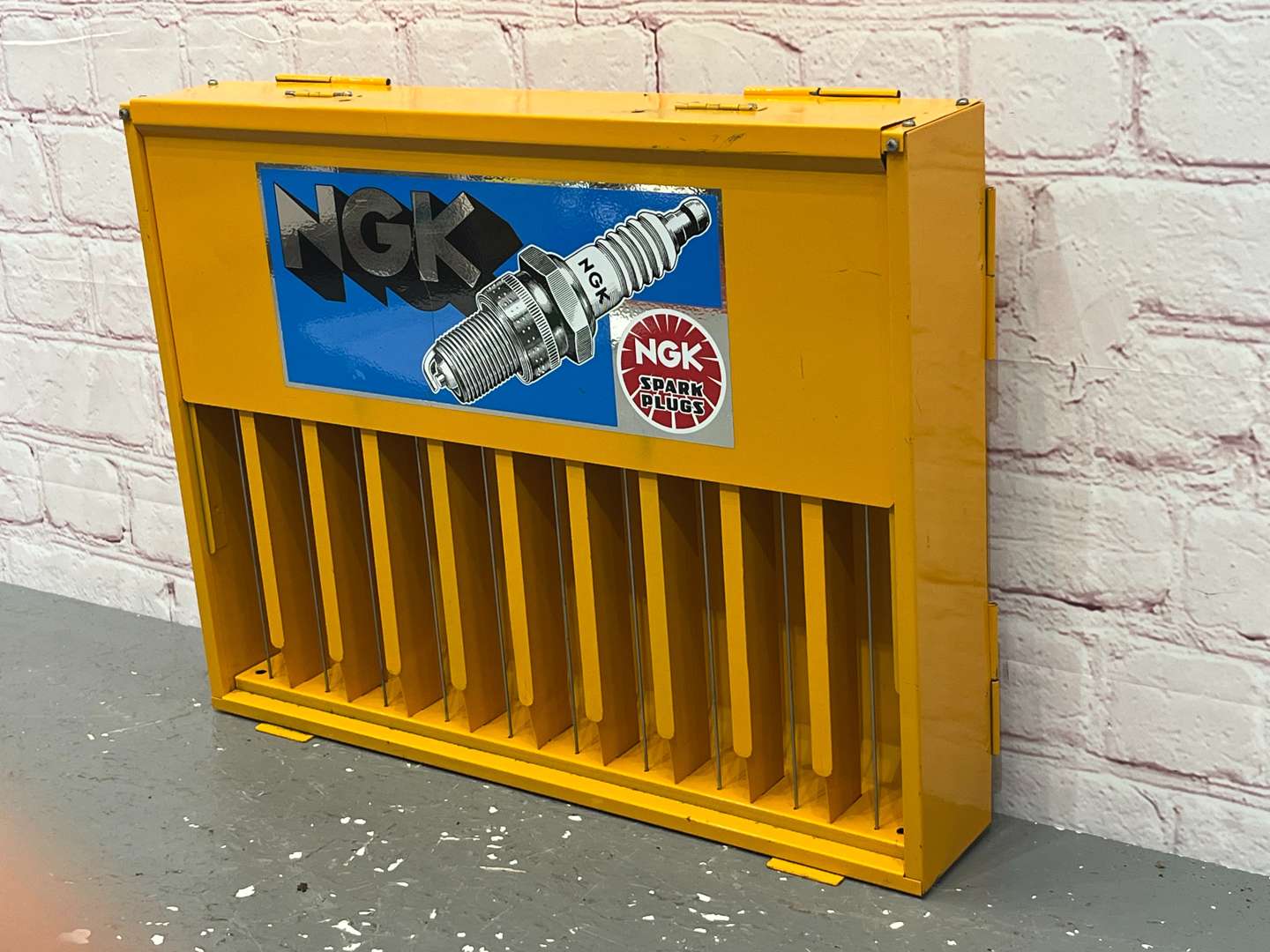 <p>NGK Spark Plug Wall Mounted Display Rack &nbsp;</p>