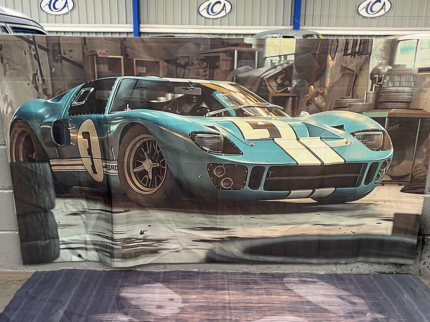 <p>Three Large Classic Car Wall Hangings</p>