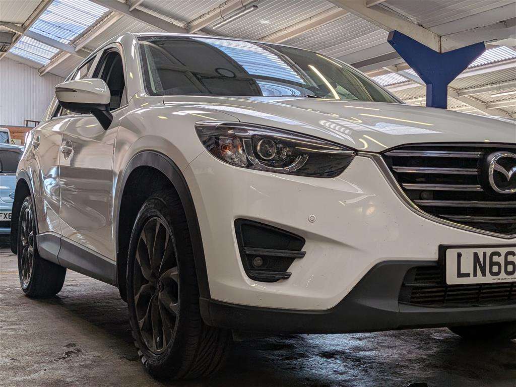 <p>2016 MAZDA CX-5 SPORT NAV D</p>