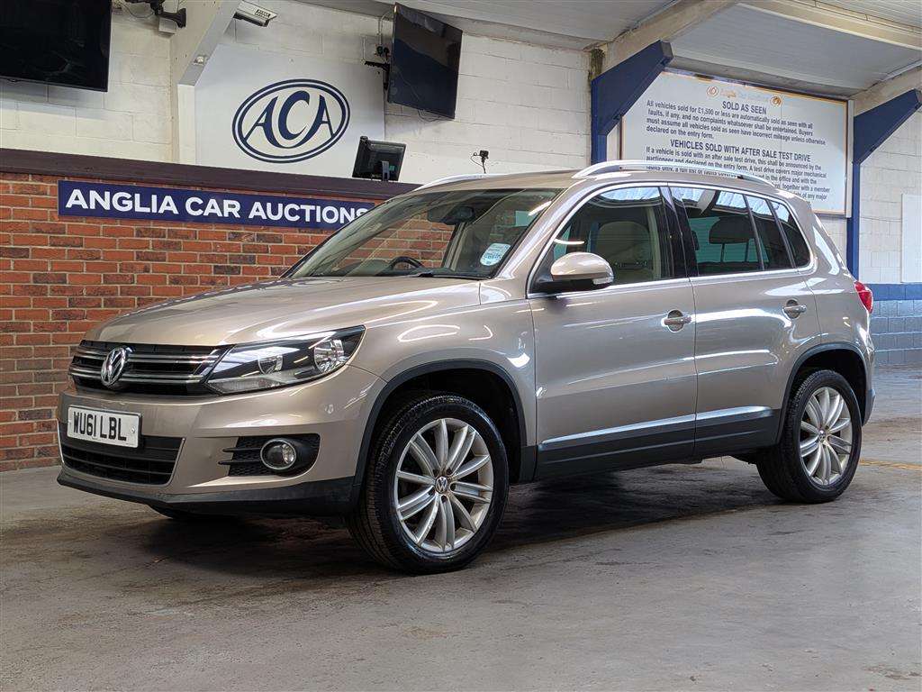 <p>2011 VOLKSWAGEN TIGUAN SPORT TDI 4MOTION</p>