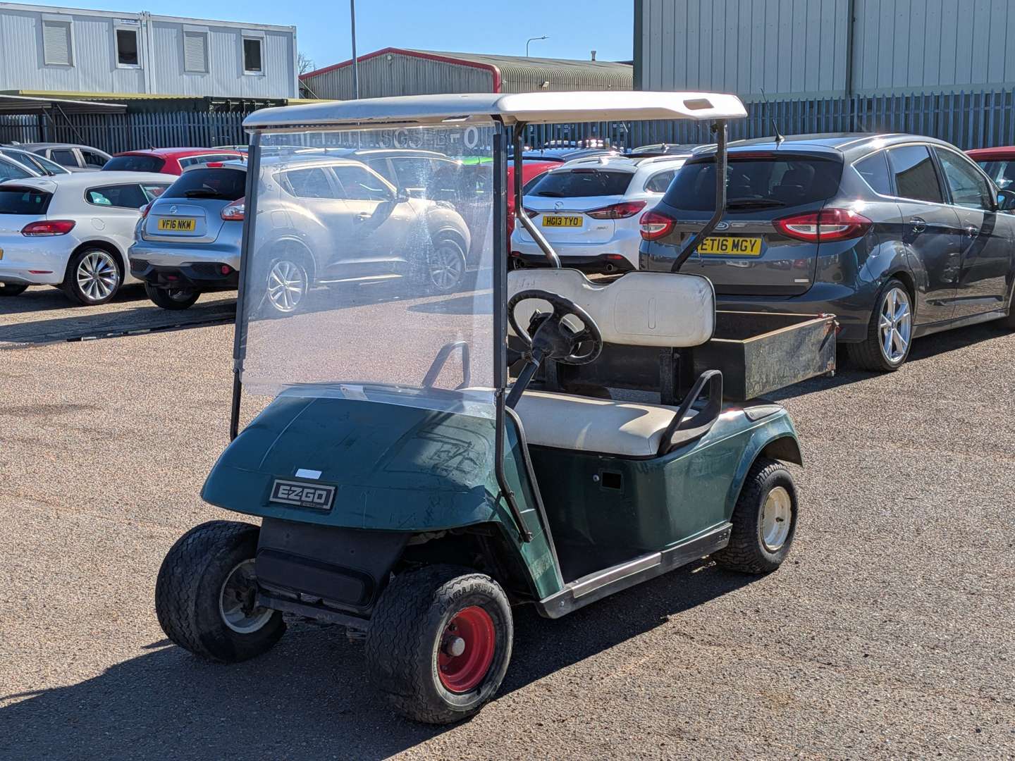 <p>CIRCA 1990 GOLF BUGGY EZGO</p>