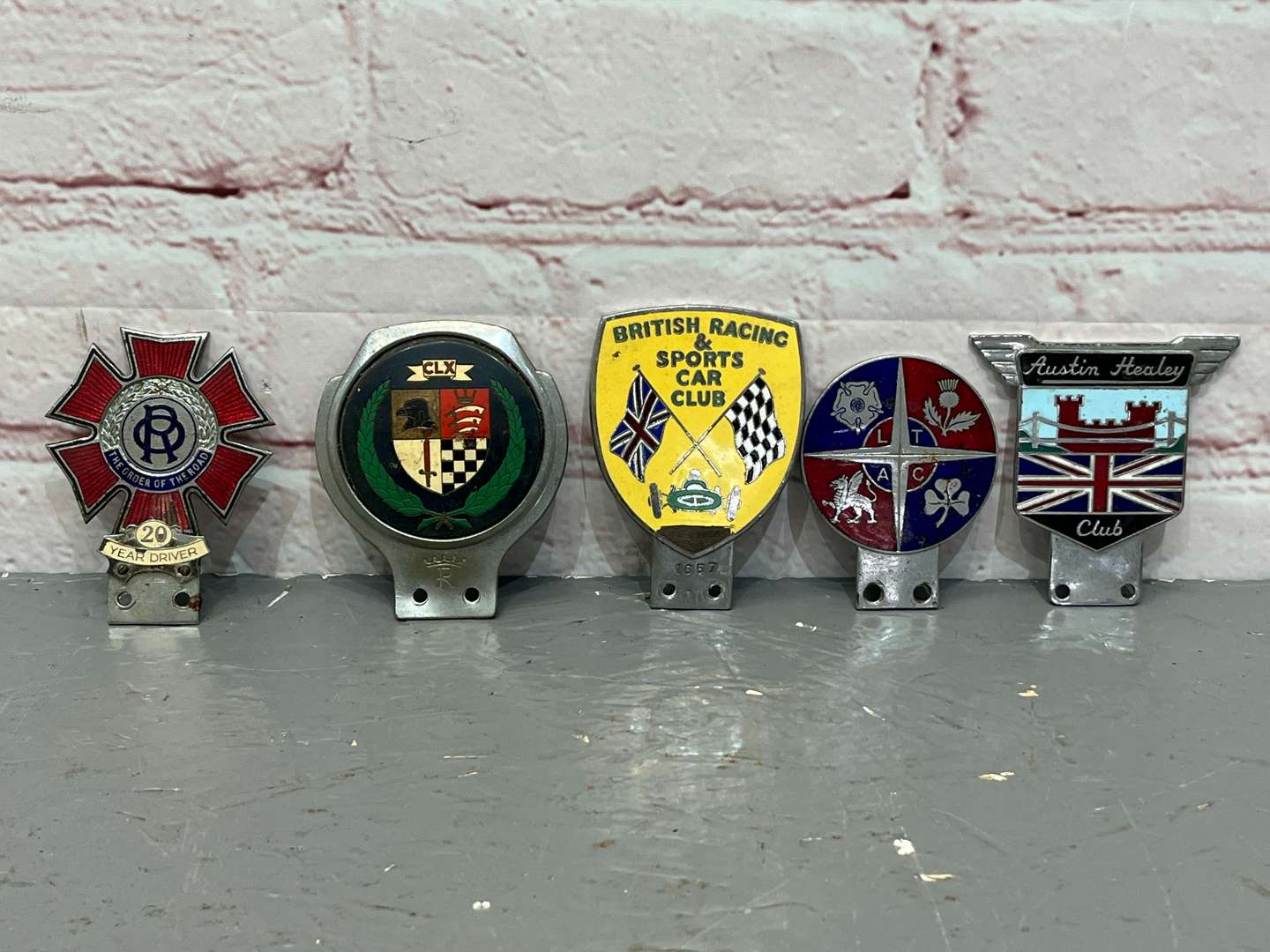 <p>Five Classic Car Badges&nbsp;</p>