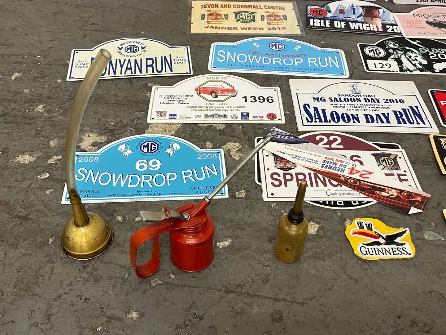 <p>Mixed Lot of Rally Plaques Oil Cans Etc</p>