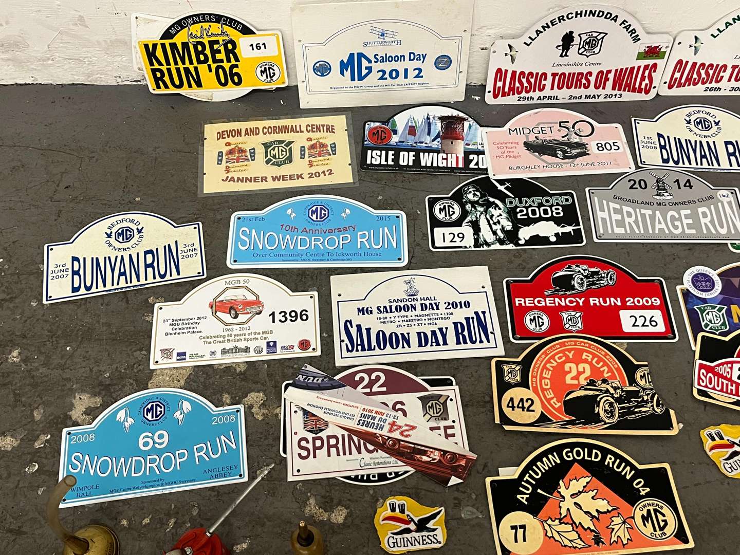 <p>Mixed Lot of Rally Plaques Oil Cans Etc</p>