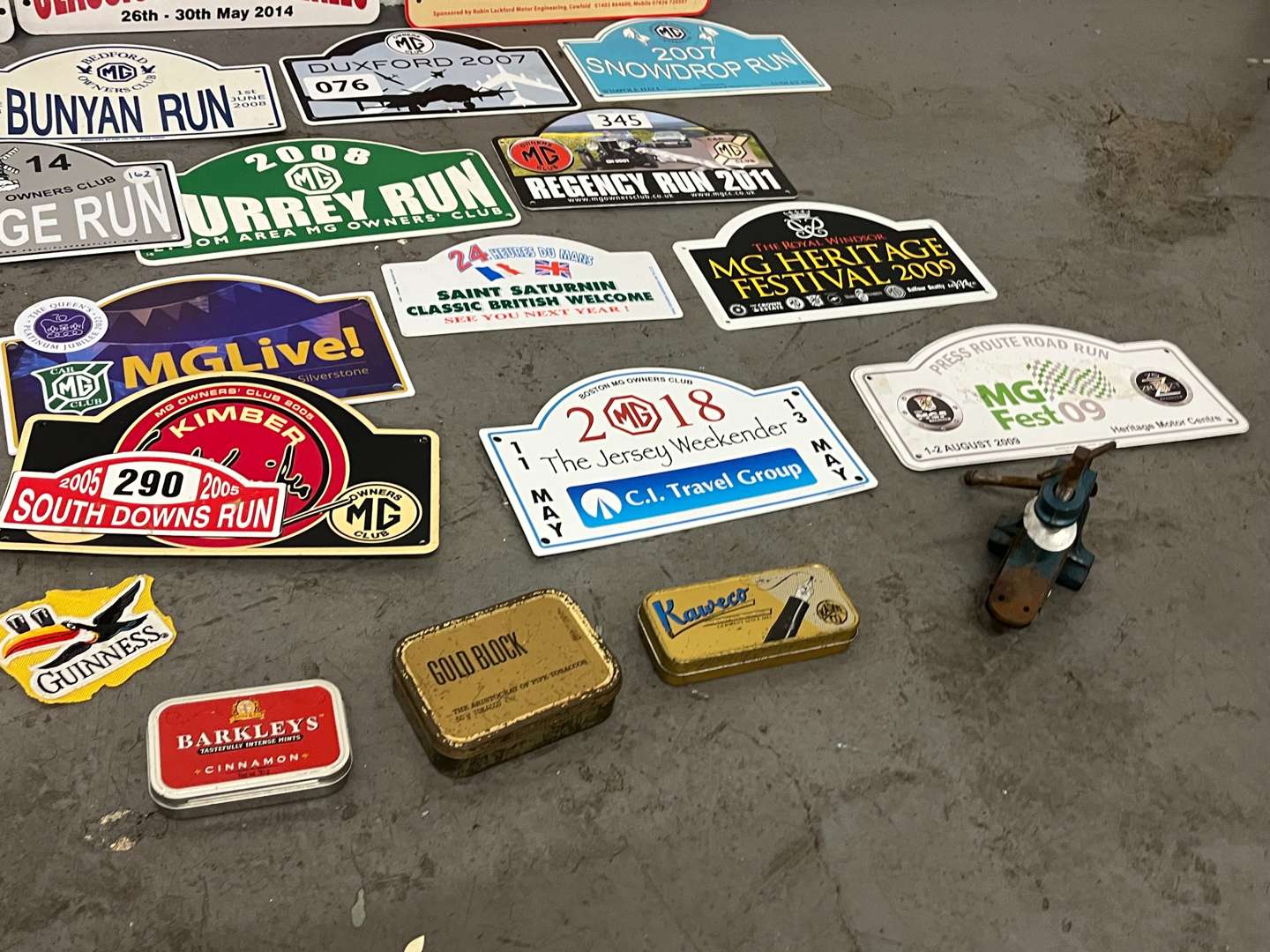 <p>Mixed Lot of Rally Plaques Oil Cans Etc</p>