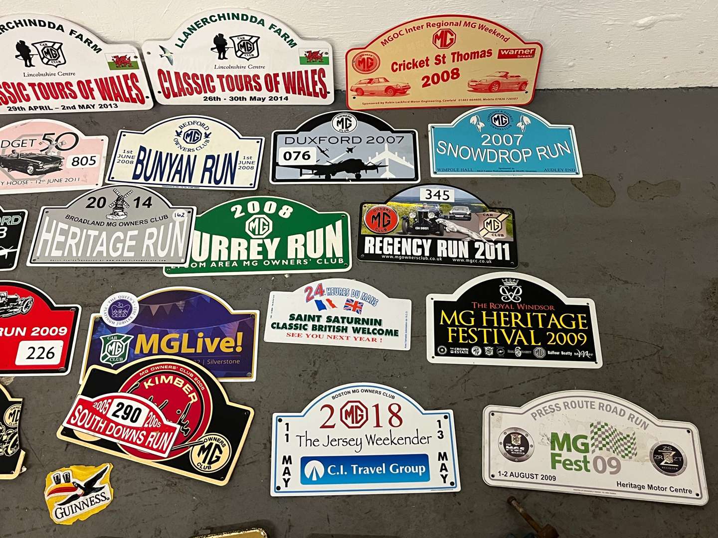 <p>Mixed Lot of Rally Plaques Oil Cans Etc</p>