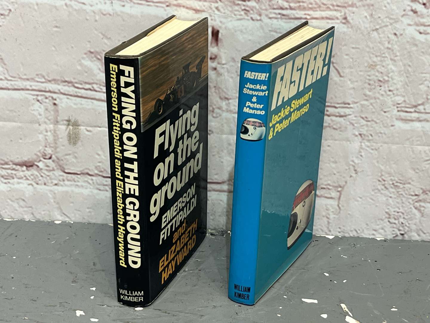 <p>Jackie Stewart Signed “Faster” & Emerson Fittipaldi Signed “ Flying on The Ground” Books</p>