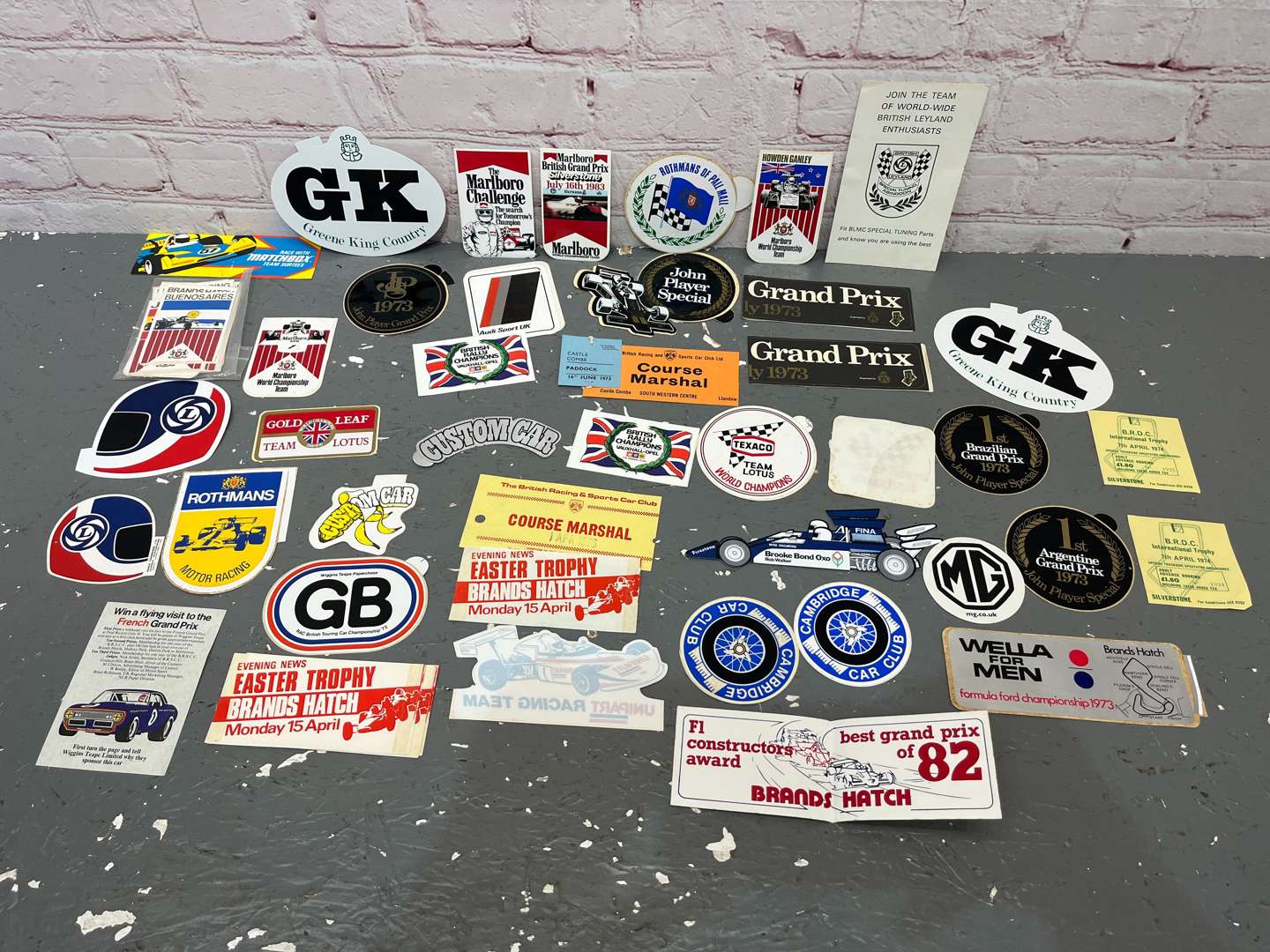 <p>Folder Containing a Quantity of 1970/80's Formula 1 Race Stickers</p>