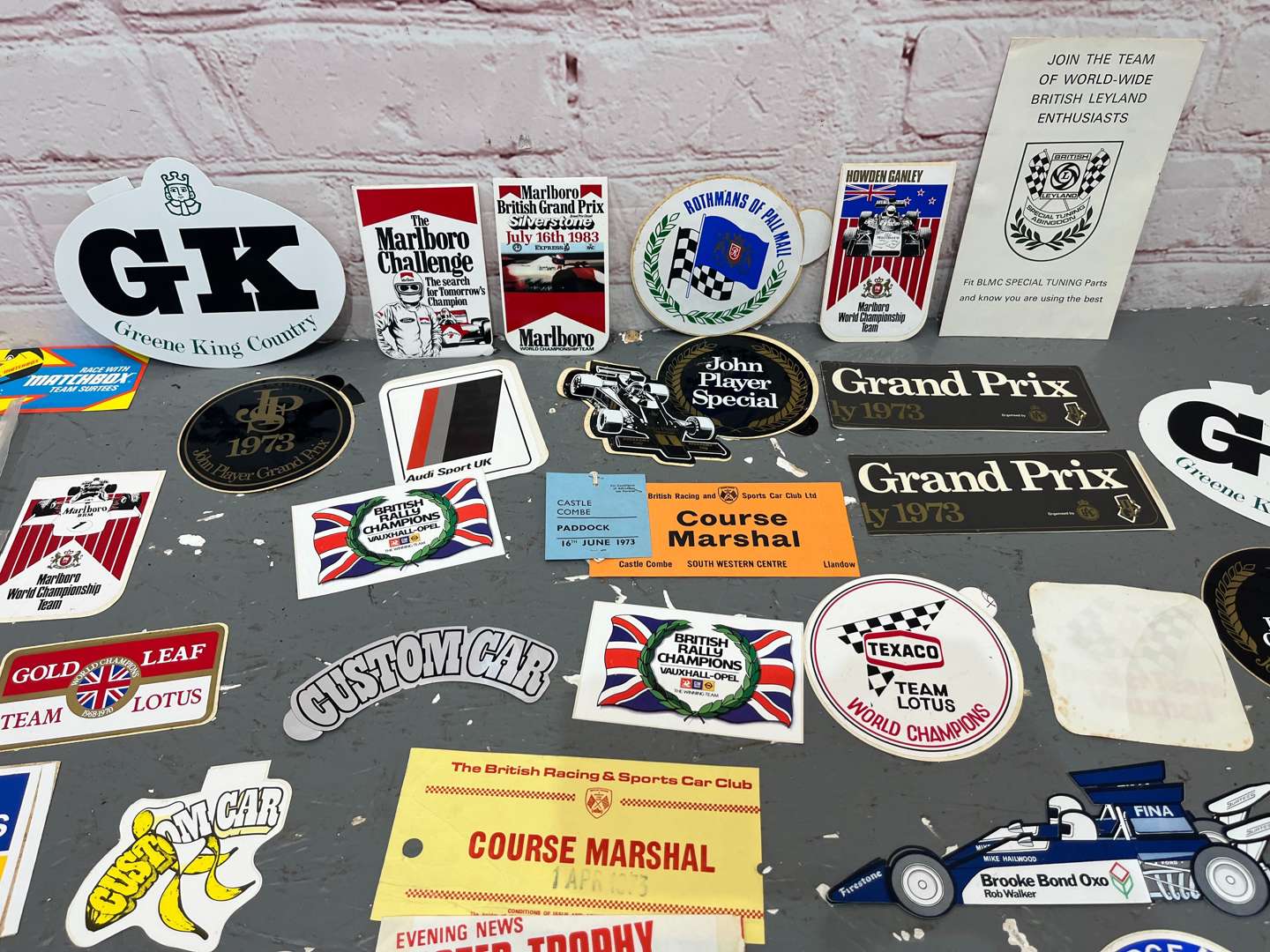<p>Folder Containing a Quantity of 1970/80's Formula 1 Race Stickers</p>