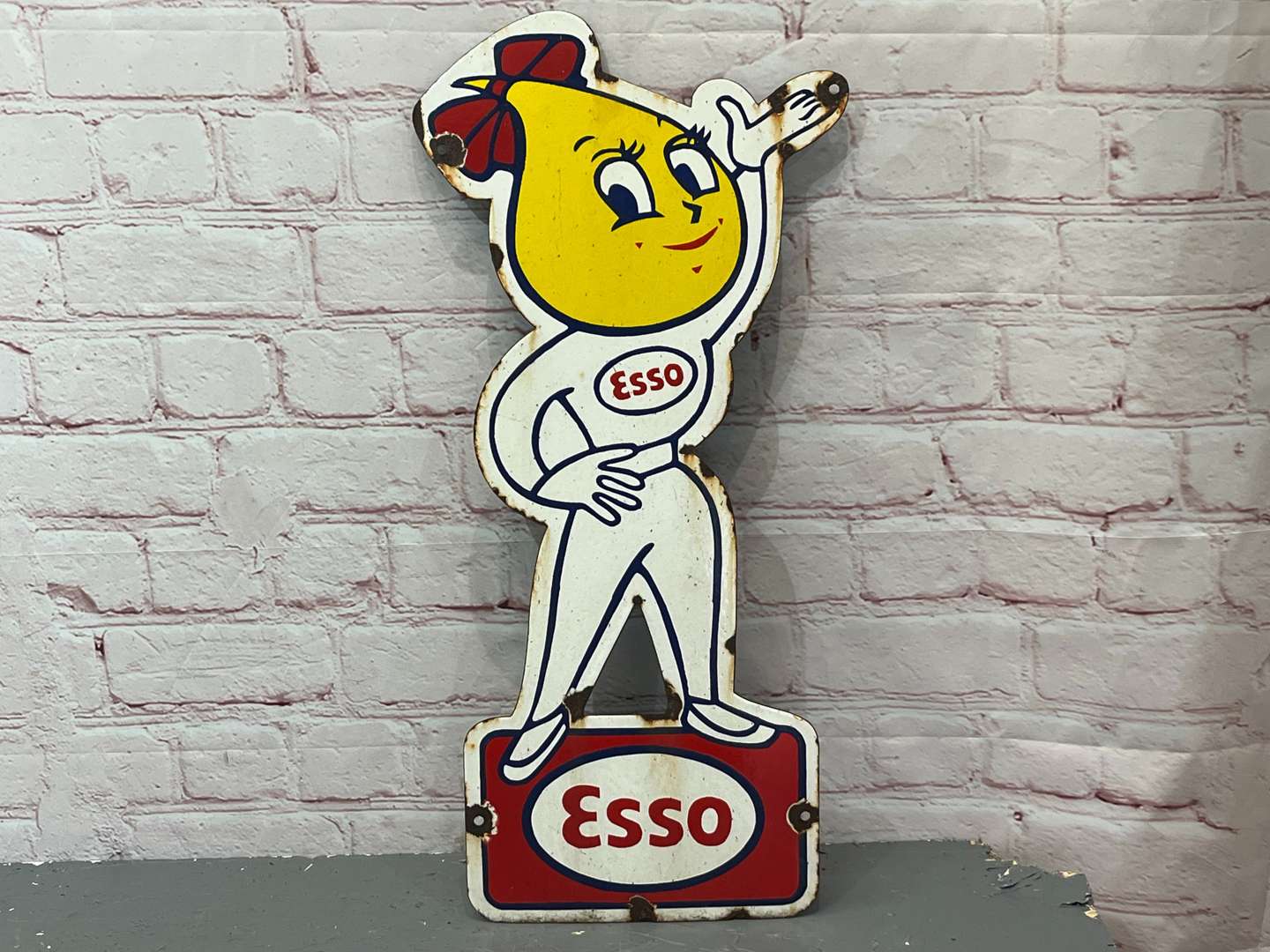 <p>Esso Mrs Drip Enamel Sign</p>