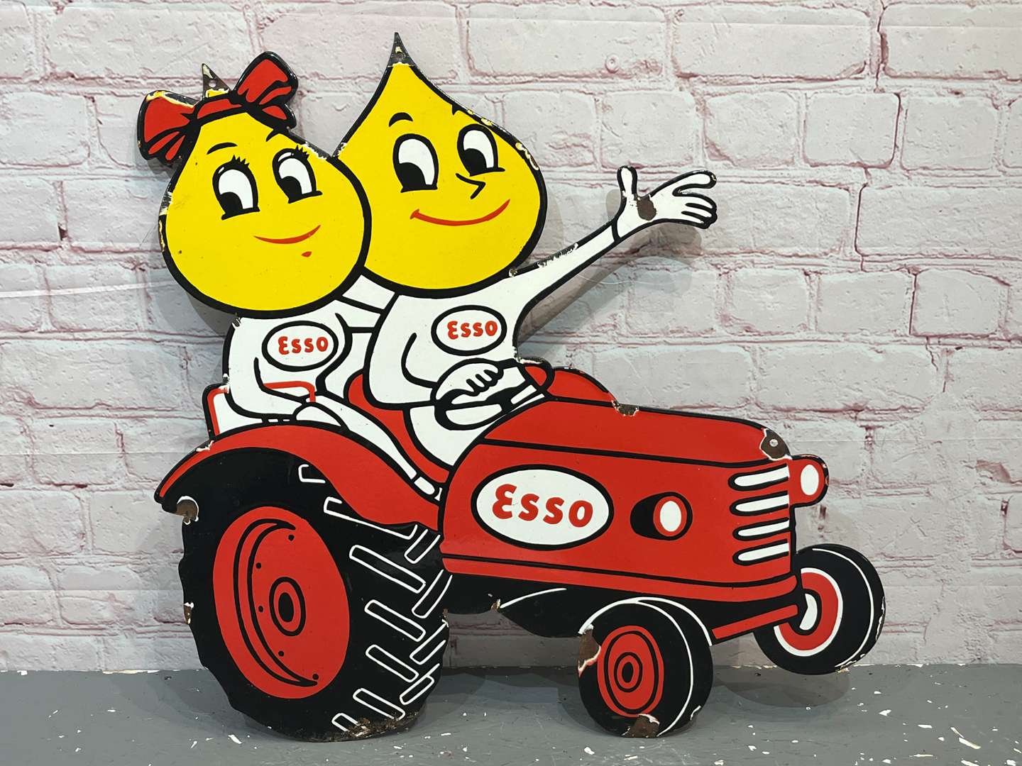<p>Esso Mr & Mrs Drip On a Tractor Enamel Sign</p>