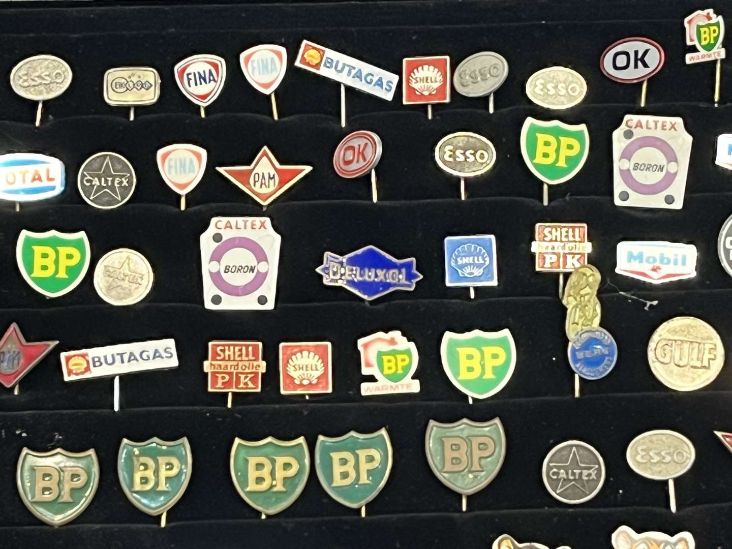 <p>Case Containing a Large Quantity Motoring Related Tie Pins&nbsp;</p>