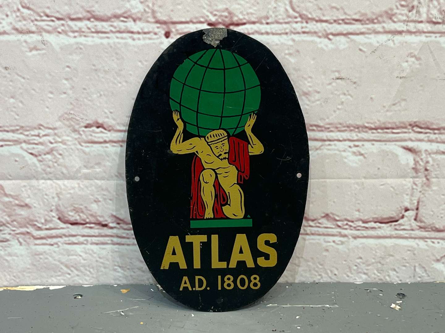 <p>Atlas A.D. 1808 Small Tin Sign</p>