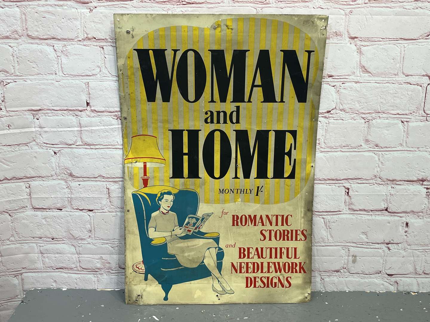 <p>Woman & Home Monthly Aluminium Sign</p>