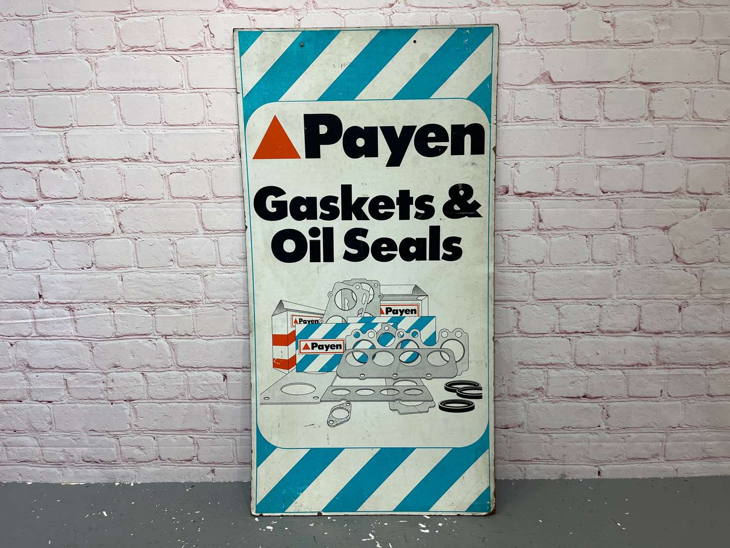 <p>Payen Gaskets & Oil Seals Sign on Board</p>