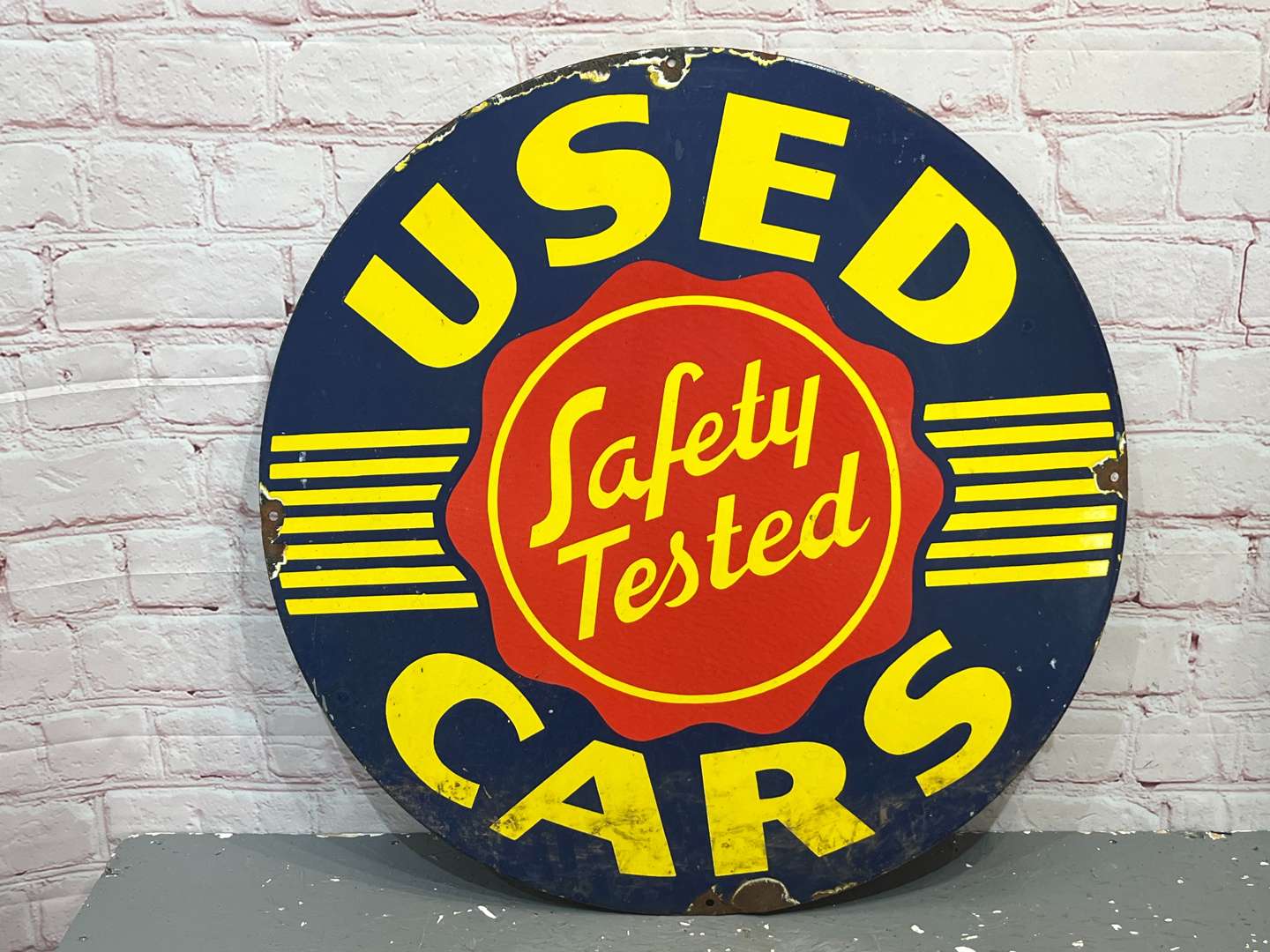 <p>Used Car Safety Tested Circular Enamel Sign</p>
