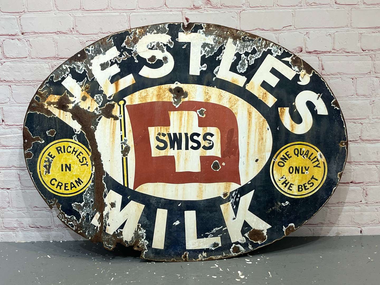 <p>Nestle's Milk Swiss Enamel Oval Sign</p>