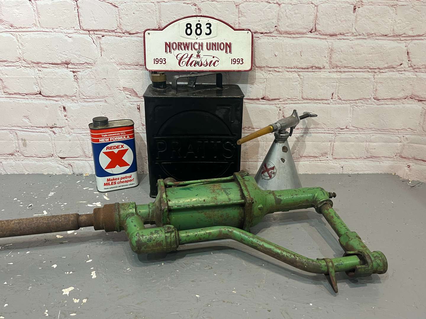<p>Two Redex Oil Cans, Pratts Two Gallon Fuel Can & Norwich Union Rally Plaque</p>