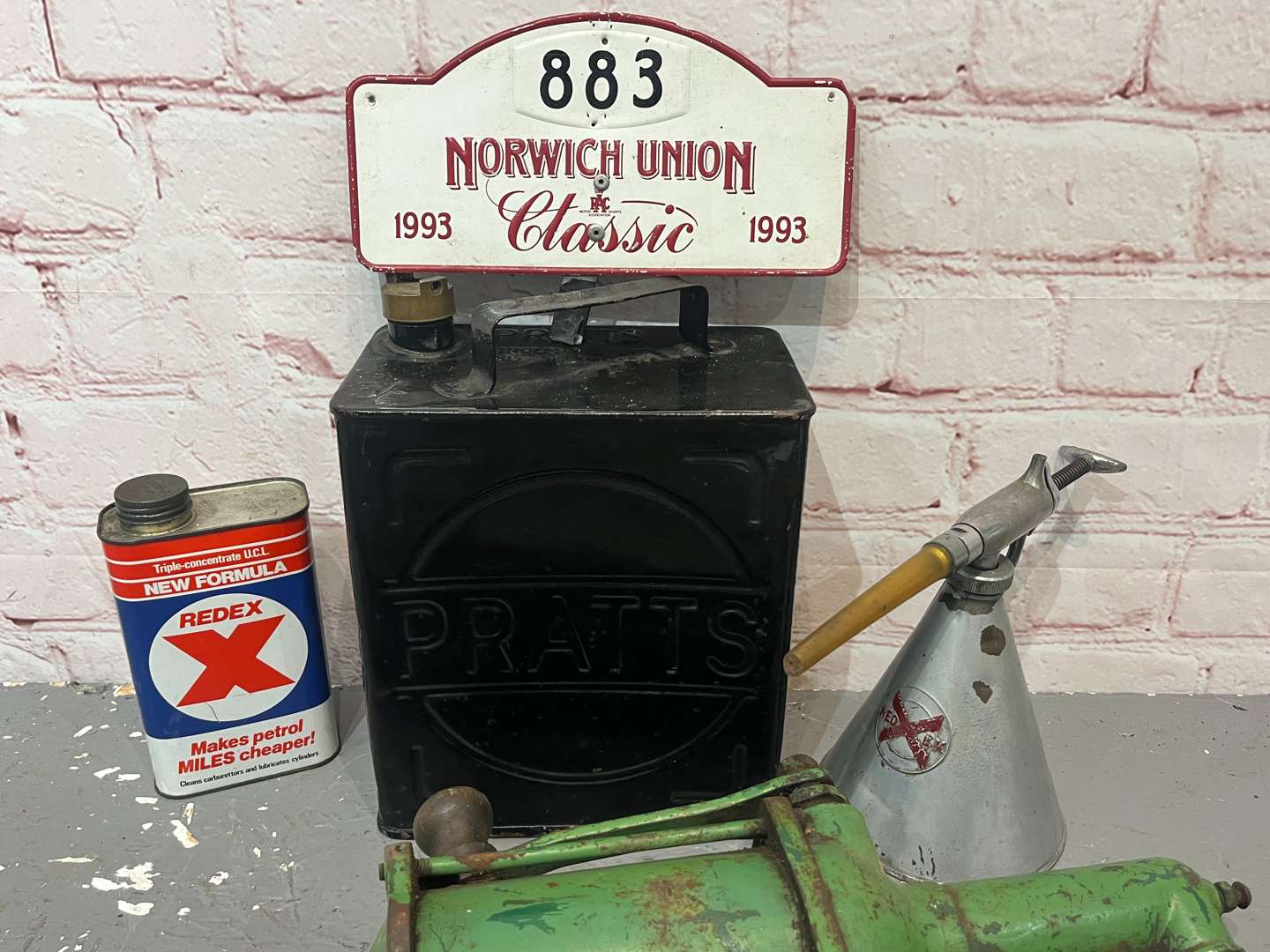 <p>Two Redex Oil Cans, Pratts Two Gallon Fuel Can & Norwich Union Rally Plaque</p>