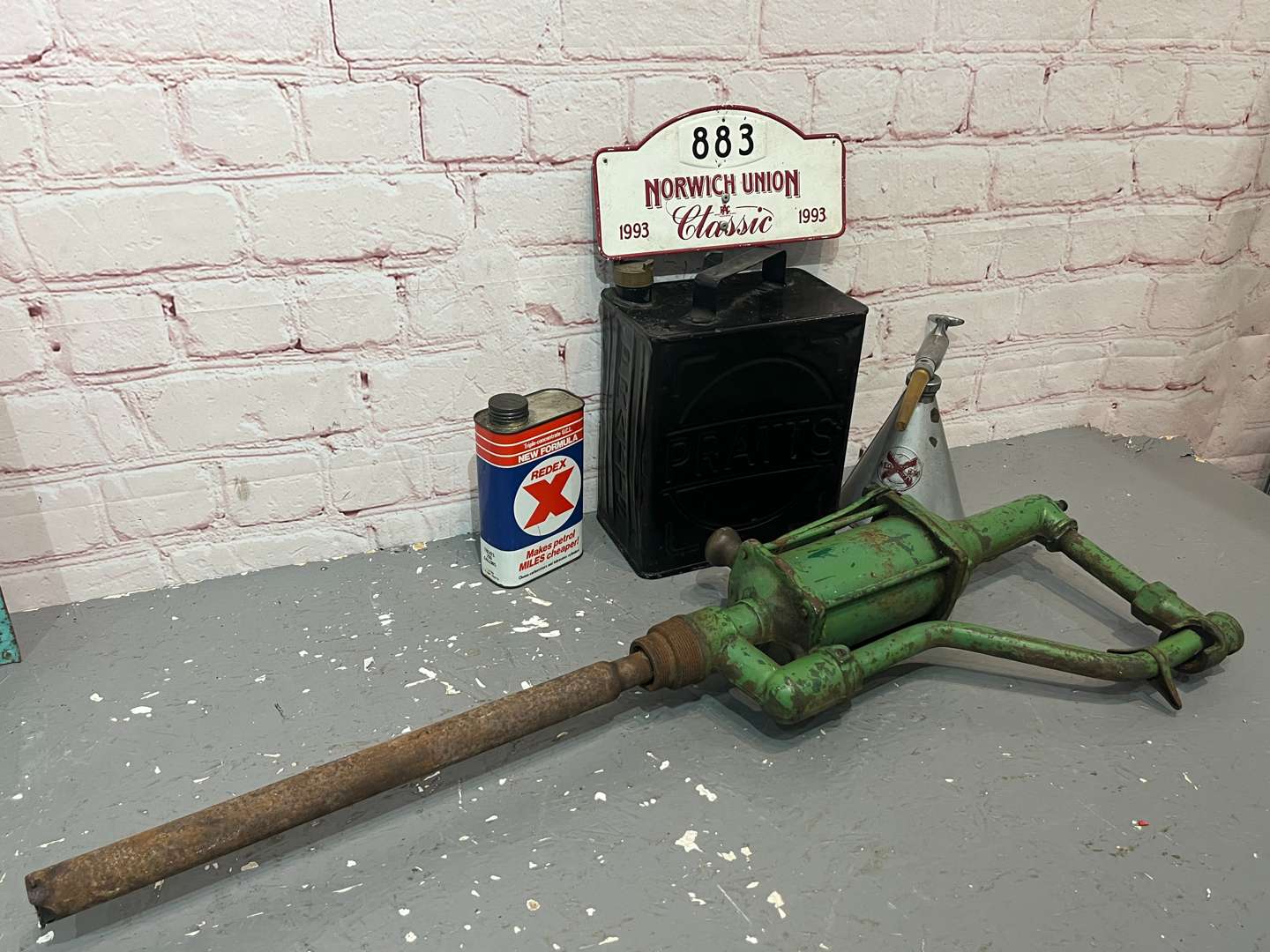 <p>Two Redex Oil Cans, Pratts Two Gallon Fuel Can & Norwich Union Rally Plaque</p>
