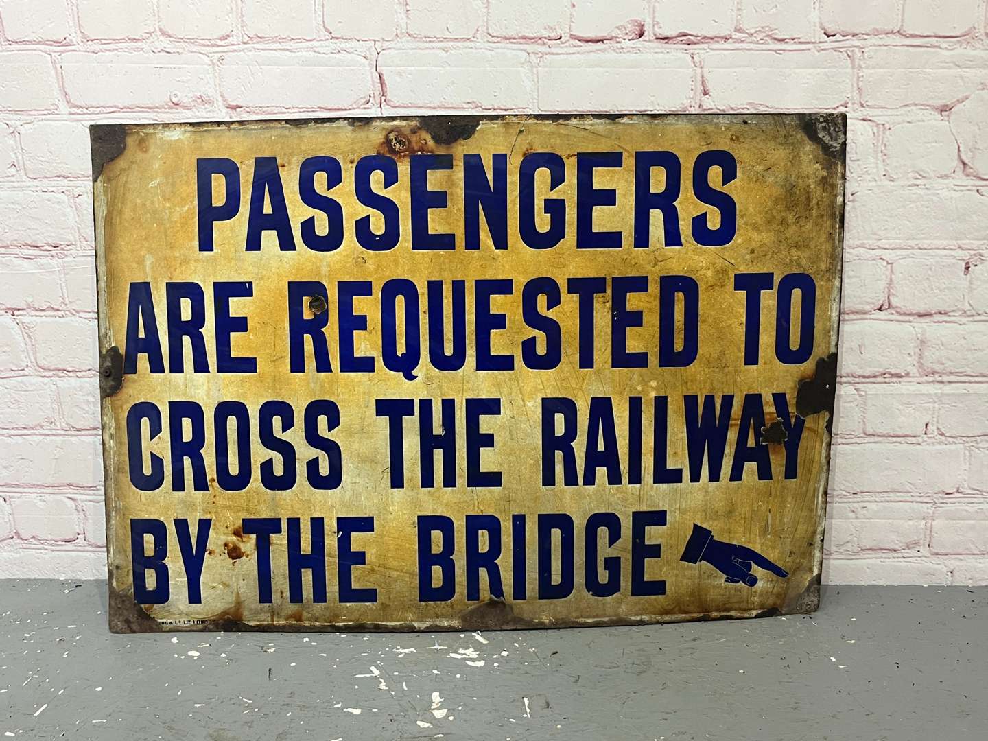 <p>Passengers Are Requested To Cross The Railway By The Bridge Enamel Sign</p>