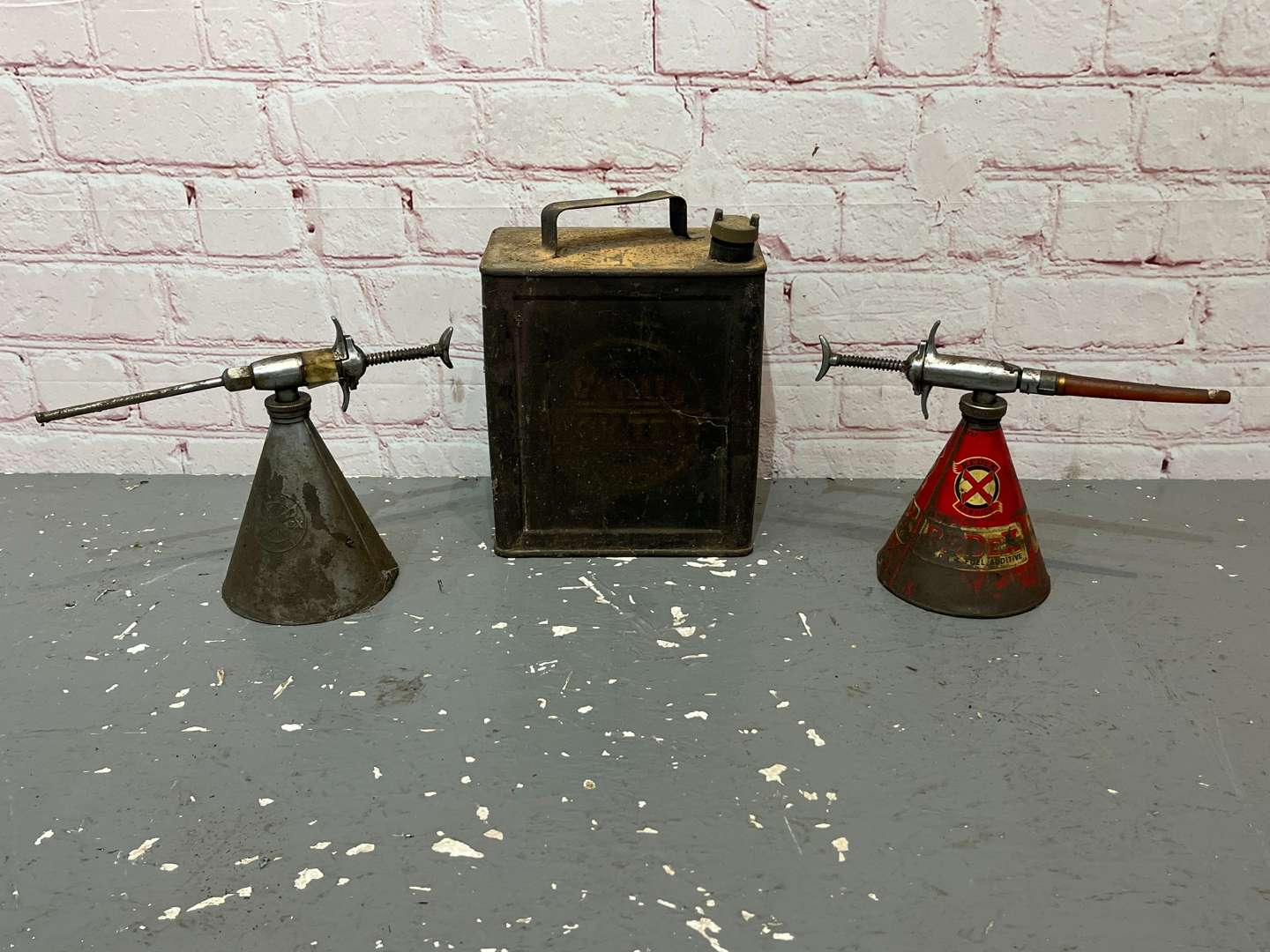 <p>Two Redex Conical Oil Cans & Pratts High Test Two Gallon Fuel Can (3)</p>