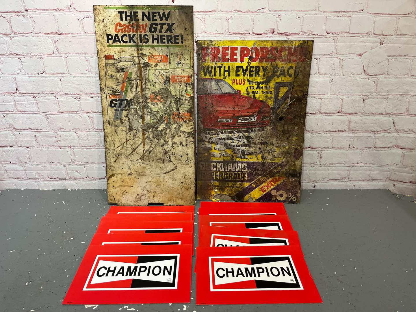 <p>Castrol GTX, Duckham Hypergrade & 12 Champion Spark Plug Cardboard Signs</p>