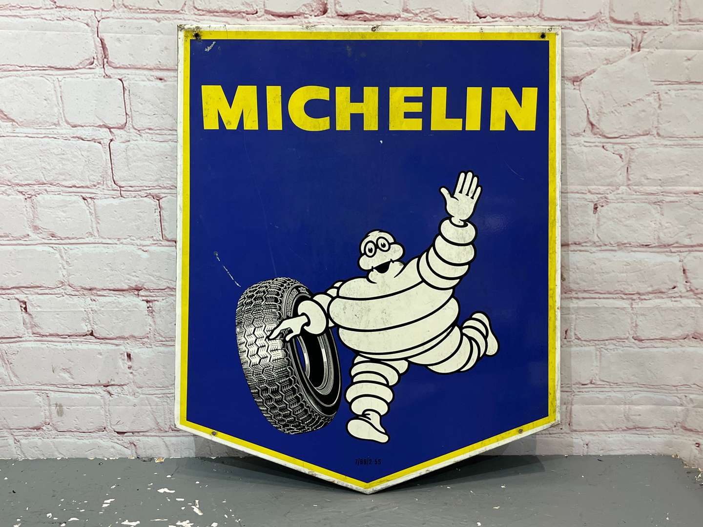 <p>Michelin 1969 Dated Running Man Sign</p>
