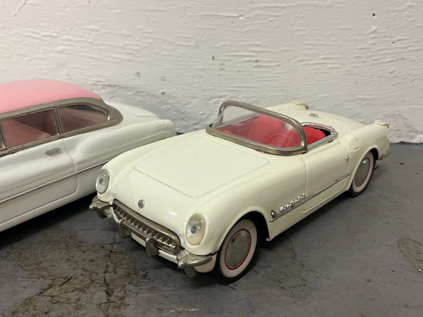 <p>Three Tin Plate Toy Cars</p>