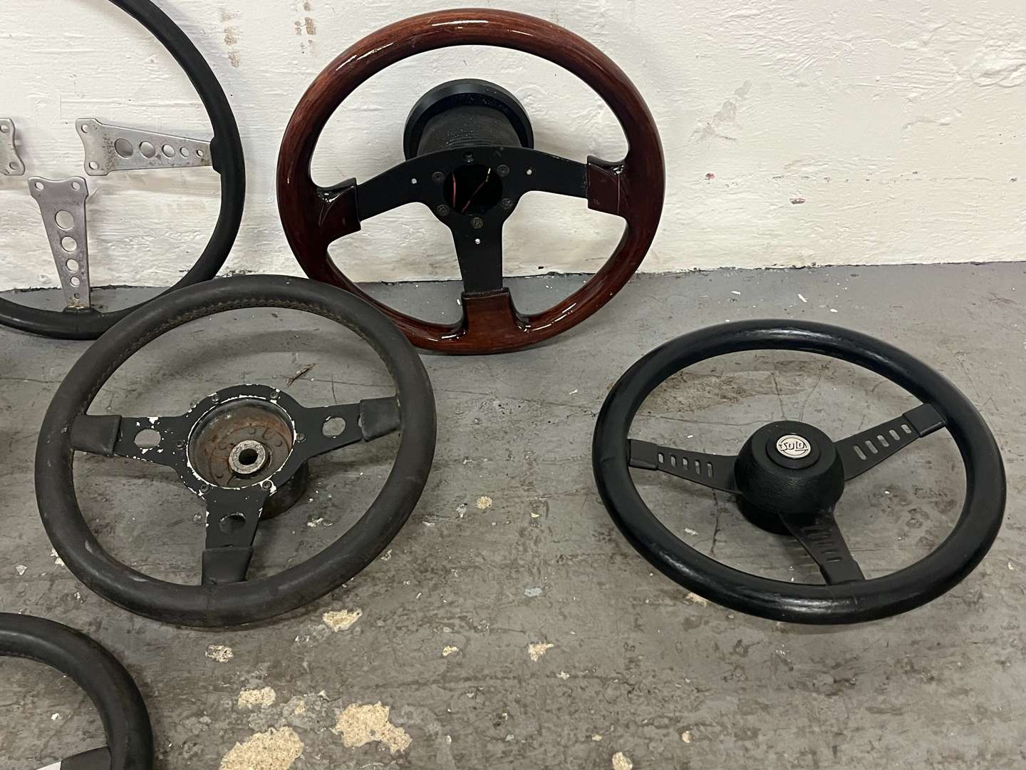 <p>Eight Classic Car Steering Wheels</p>