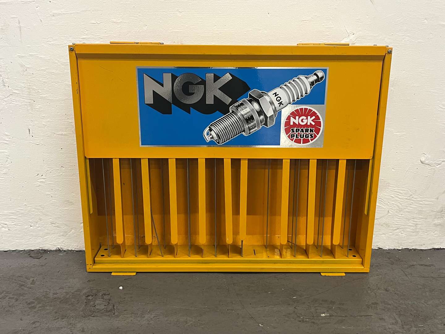 <p>NGK Spark Plug Wall Mounted Display Cabinet</p>