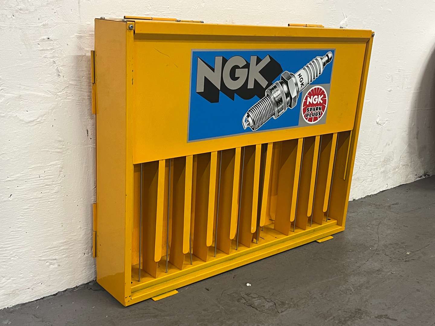 <p>NGK Spark Plug Wall Mounted Display Cabinet</p>