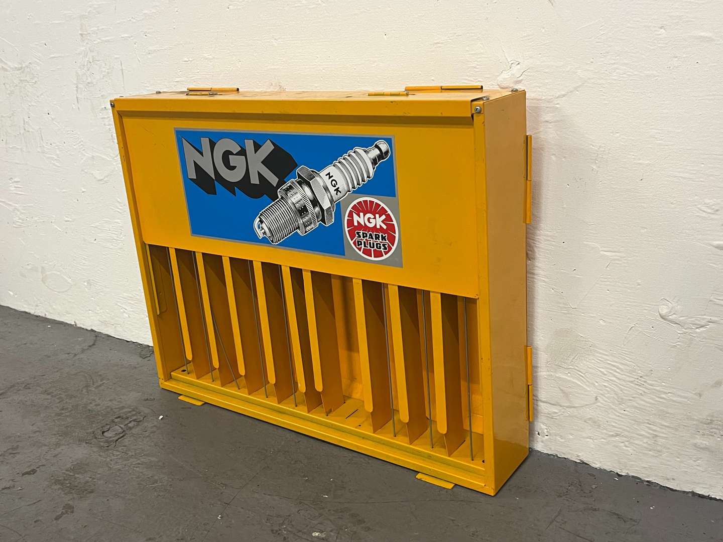 <p>NGK Spark Plug Wall Mounted Display Cabinet</p>