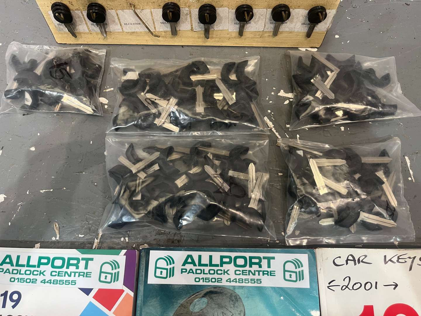 <p>Key Board and Five Bags of Key Blanks For Various Models 2004 - 2022&nbsp;</p>