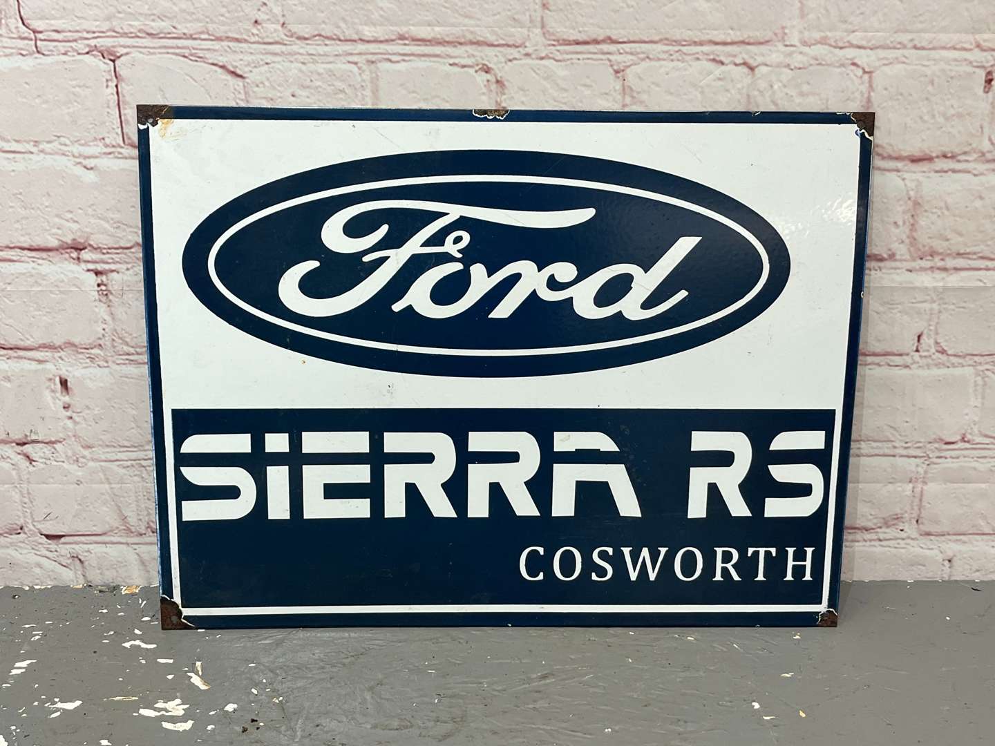 <p>Ford Sierra RS Cosworth Enamel Sign</p>