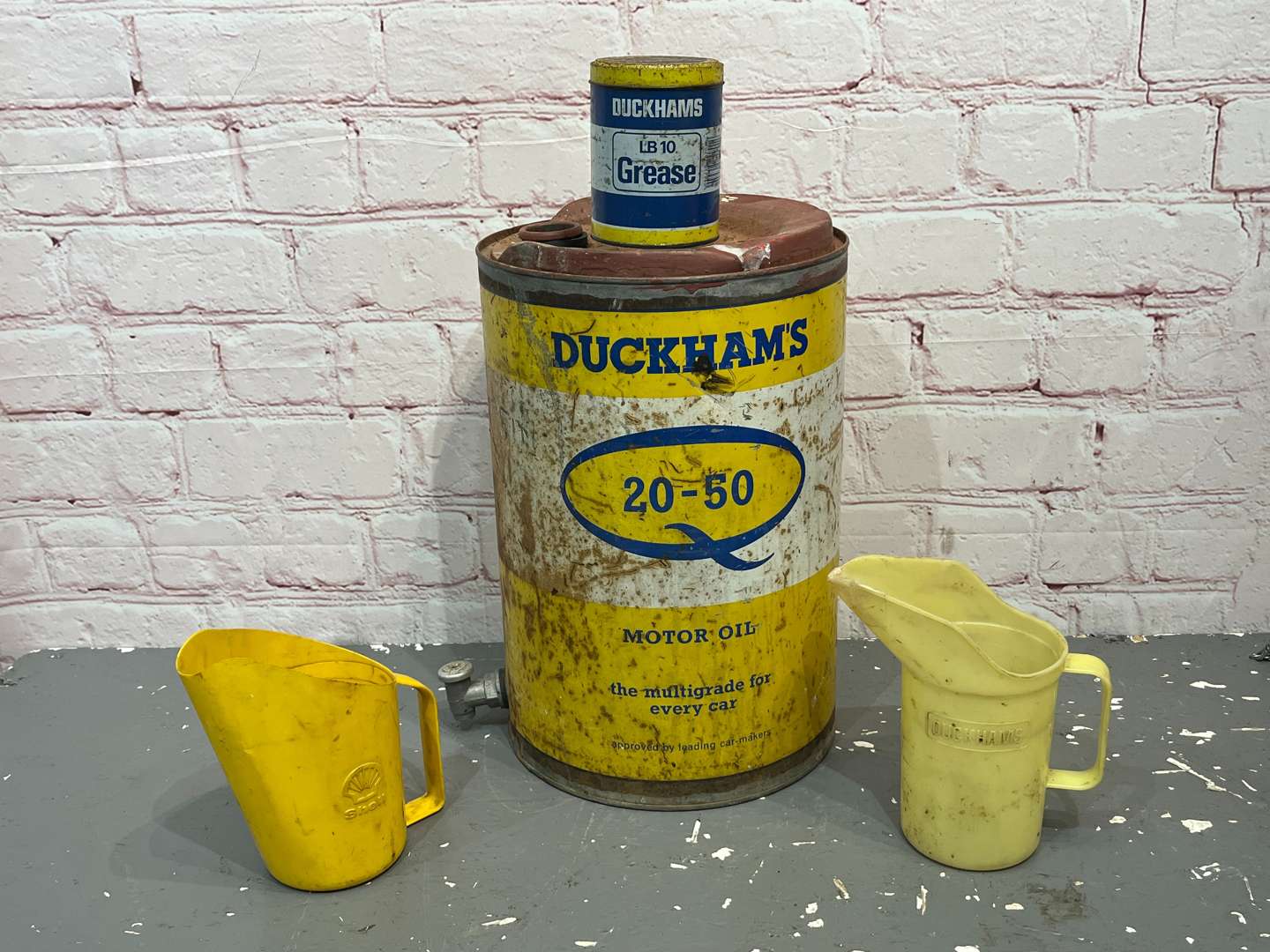 <p>Duckhams Oil Drum, Grease Tin & Two Pourers (4)</p>