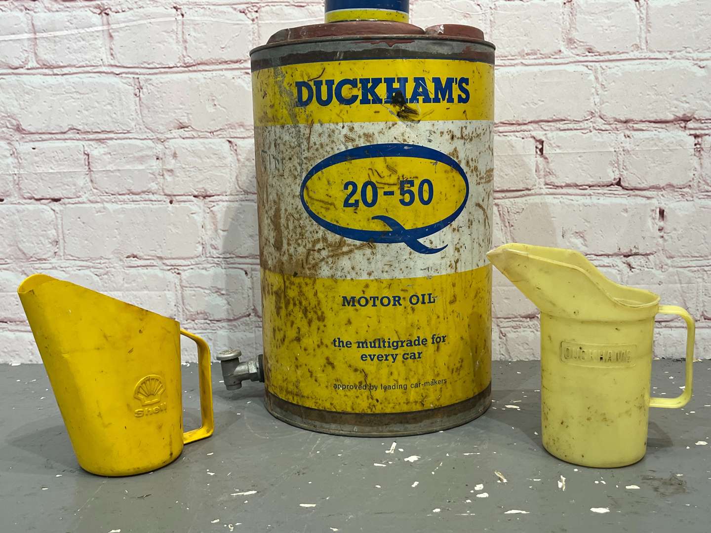 <p>Duckhams Oil Drum, Grease Tin & Two Pourers (4)</p>